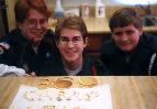 Neil, Aaron, and Nick Posing By the Pancake Art