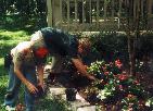 Aaron Croyle plants flowers around Jack Nicklaus' House!